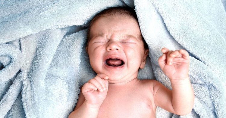 newborn passing gas and crying