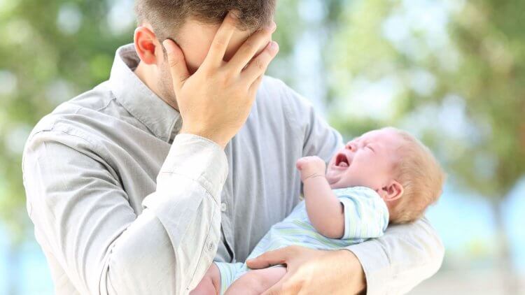 One in 10 dads suffer from male postpartum depression, yet it's rarely talked about. Find out what you need to know, including risk factors and remedies.