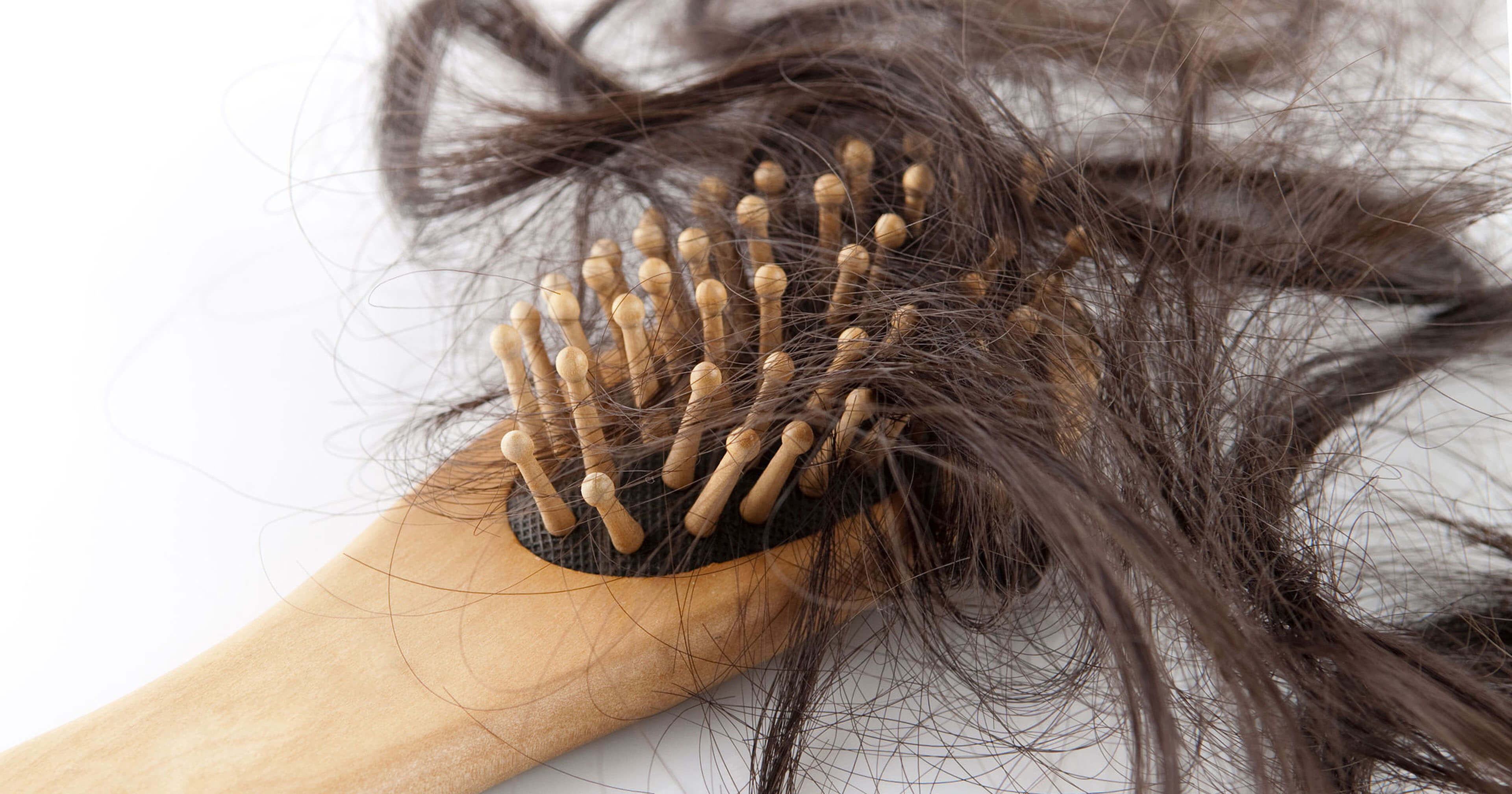 Postpartum Hair Loss: Natural Treatments & Remedies
