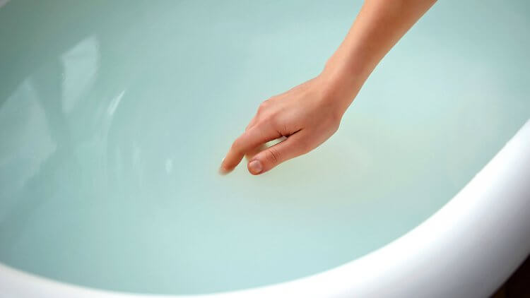 Oh my aching... perenium? Learn how a sitz bath can help with postpartum healing. Plus, try one of these soothing sitz bath recipes.