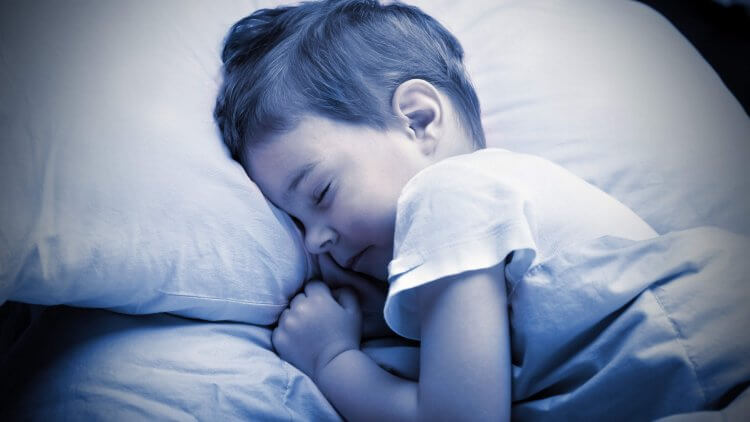 How many hours of sleep do kids need? Learn how to create a bedtime routine, get them to stay in bed, and even how to handle sleep during vacation time.