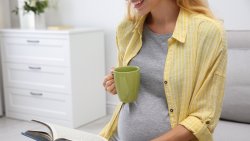 Collagen during pregnancy woman drinking beverage with collagen protein powder